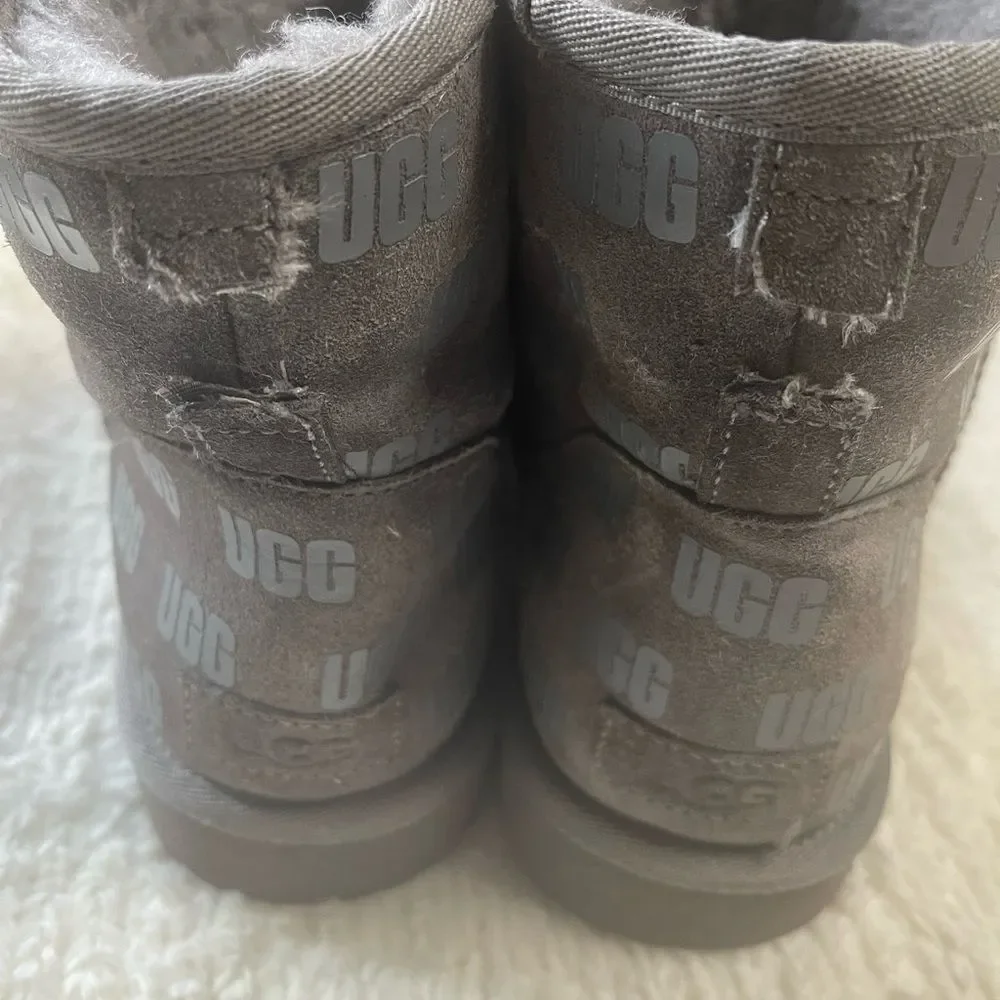 UGG Men’s Classic Mini II UGG Print Gray suede Boots  logo rubberized print SZ10